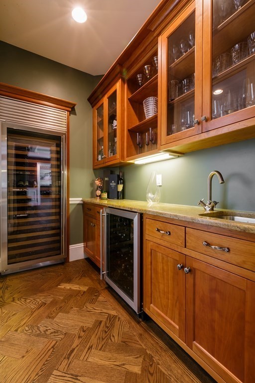 79 Oxbow Road Concord, MA 01742 - Photo 9 of 36 a kitchen with stainless steel appliances granite countertop a stove and cabinets