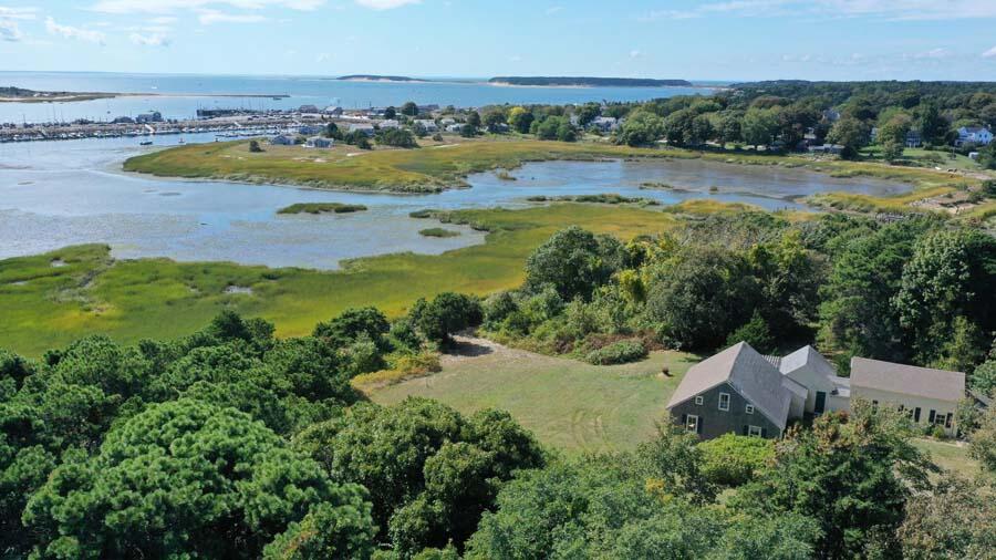125 Pine Point Road Wellfleet, MA 02667 - Photo 24 of 49 an aerial view of residential houses with outdoor space and river