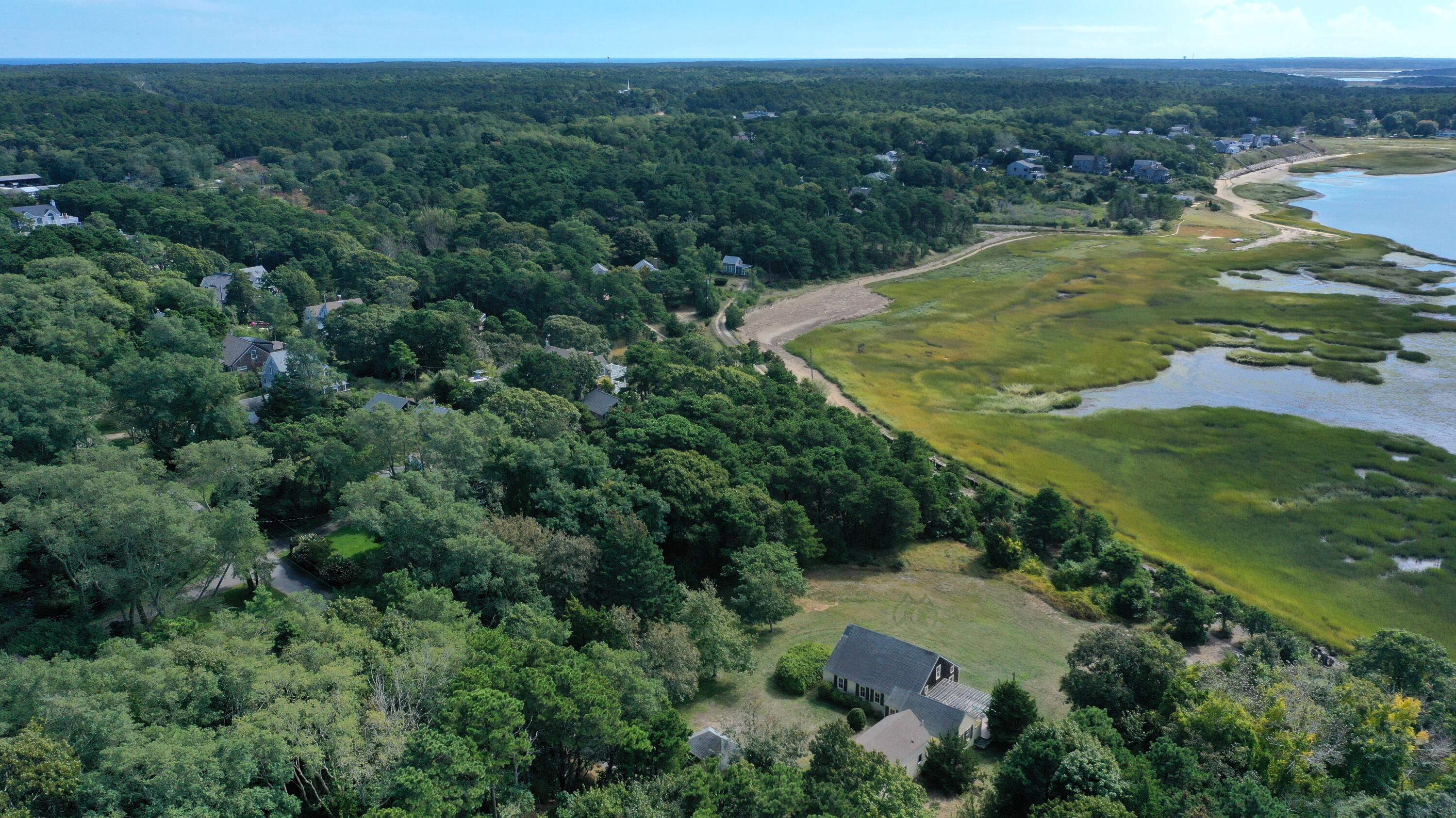 125 Pine Point Road Wellfleet, MA 02667 - Photo 39 of 49 an aerial view of a house with a yard