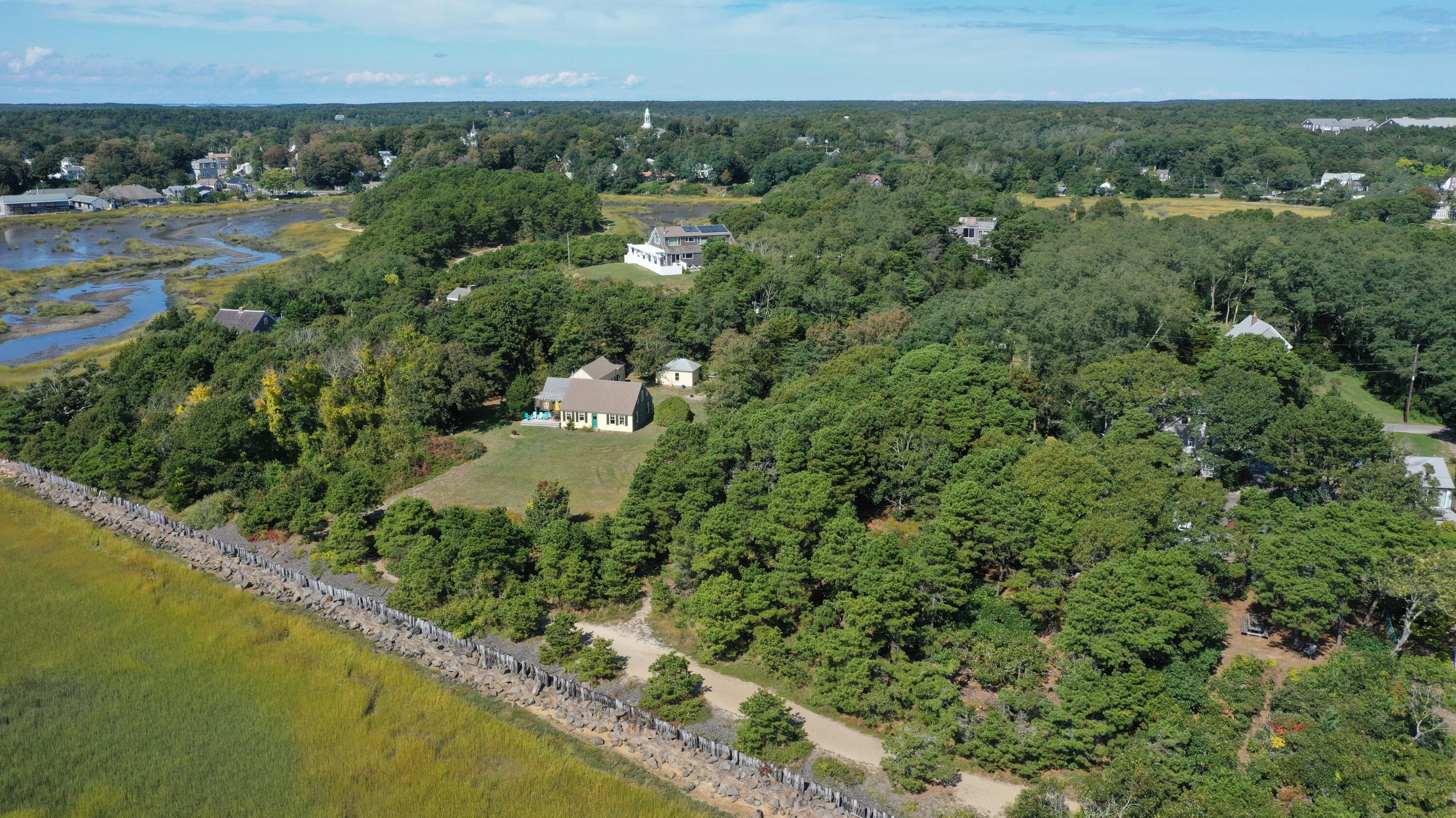 125 Pine Point Road Wellfleet, MA 02667 - Photo 42 of 49 an aerial view of residential house with outdoor space and trees all around