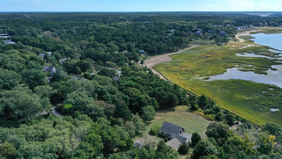 125 Pine Point Road Wellfleet, MA 02667 - Photo 7 of 49 an aerial view of a house with a yard