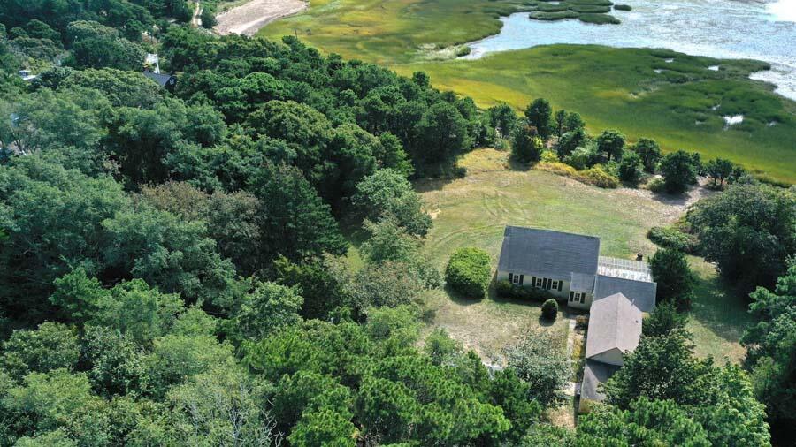 125 Pine Point Road Wellfleet, MA 02667 - Photo 9 of 49 an aerial view of a house with pool outdoor seating and yard