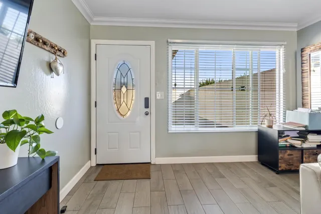 a view of livingroom with hardwood floor and a window