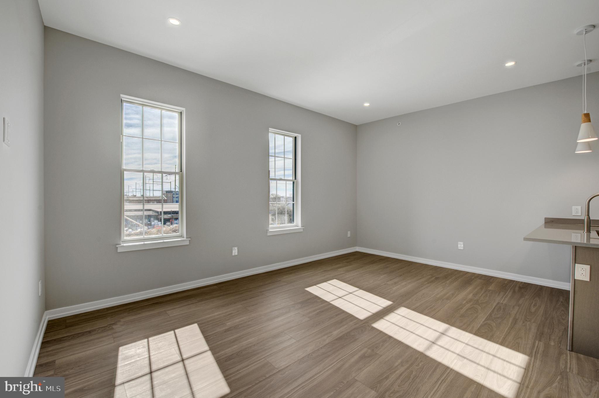 2445 Innovator Way, Unit 4G Philadelphia, PA 19146 - Photo 11 of 32 a view of an empty room and window