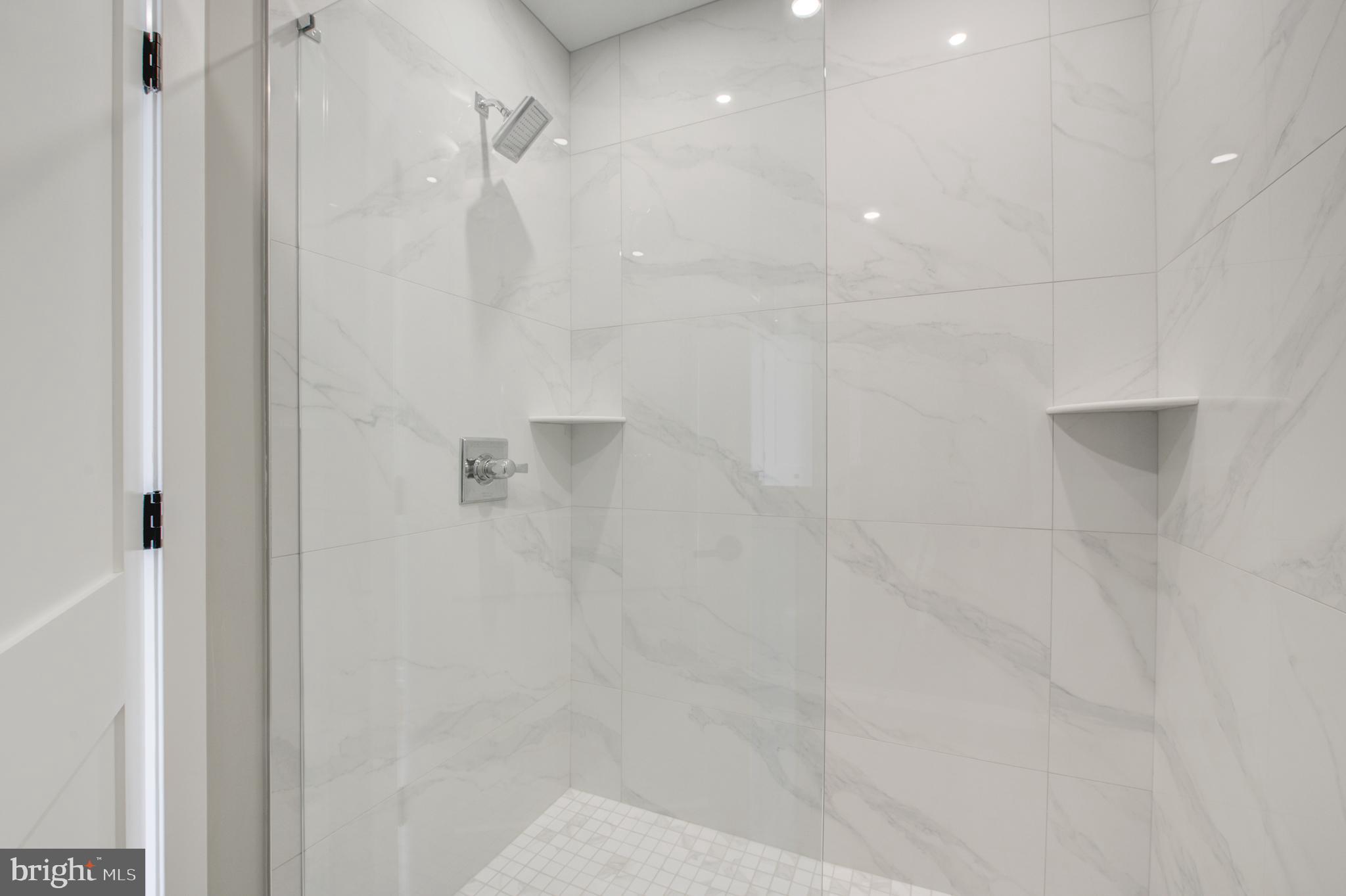 2445 Innovator Way, Unit 4G Philadelphia, PA 19146 - Photo 17 of 32 a bathroom with a shower