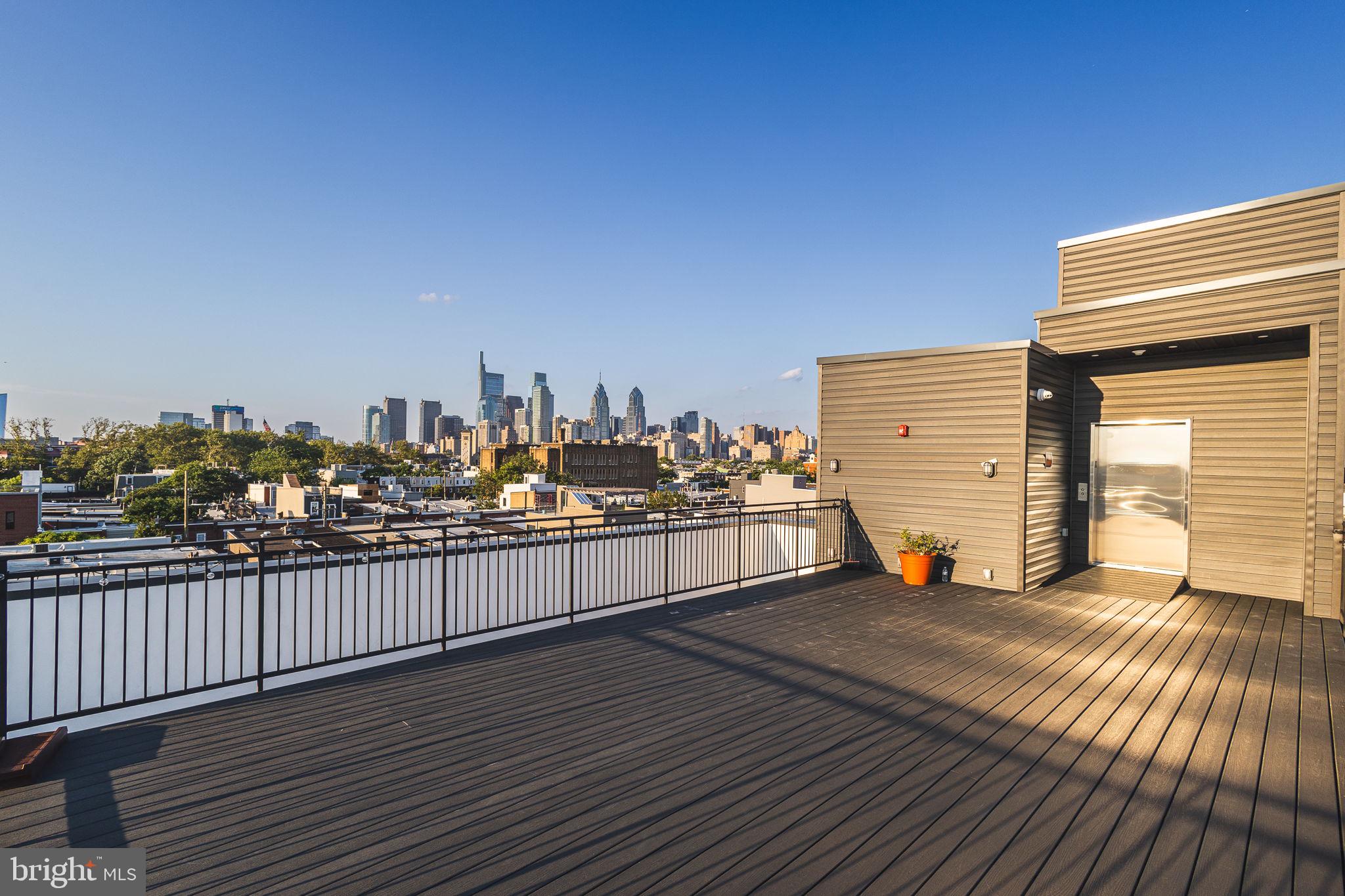 2445 Innovator Way, Unit 4G Philadelphia, PA 19146 - Photo 20 of 32 a view of a terrace with outdoor seating