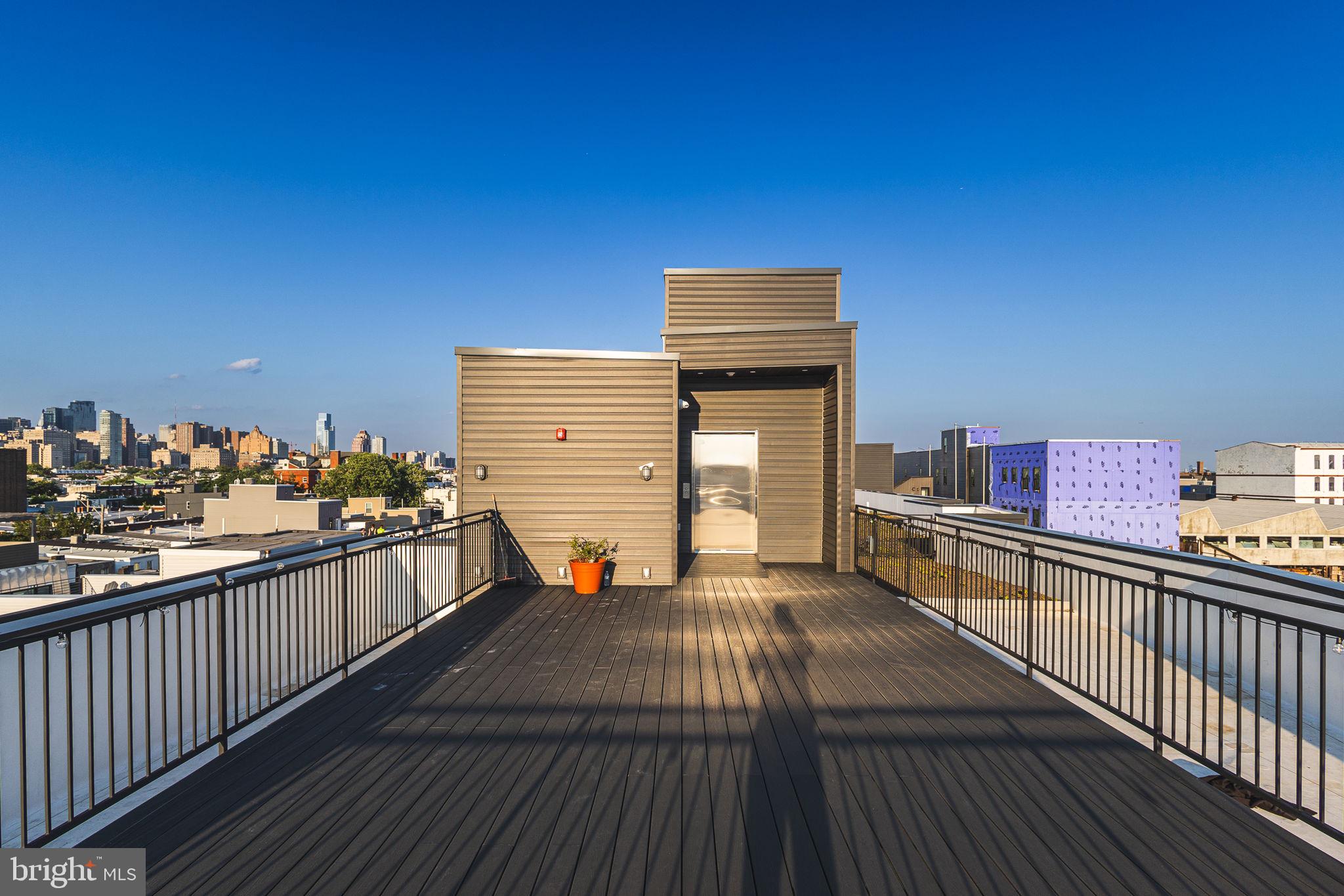 2445 Innovator Way, Unit 4G Philadelphia, PA 19146 - Photo 21 of 32 a view of a terrace with seating space