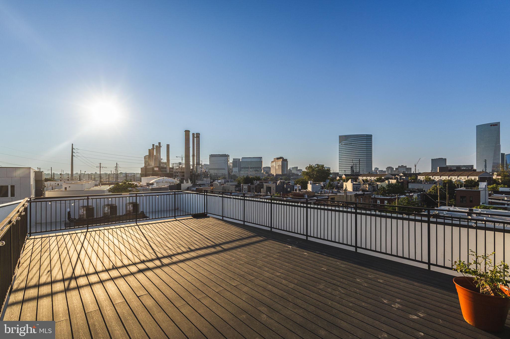 2445 Innovator Way, Unit 4G Philadelphia, PA 19146 - Photo 24 of 32 a view of a balcony with wooden floor