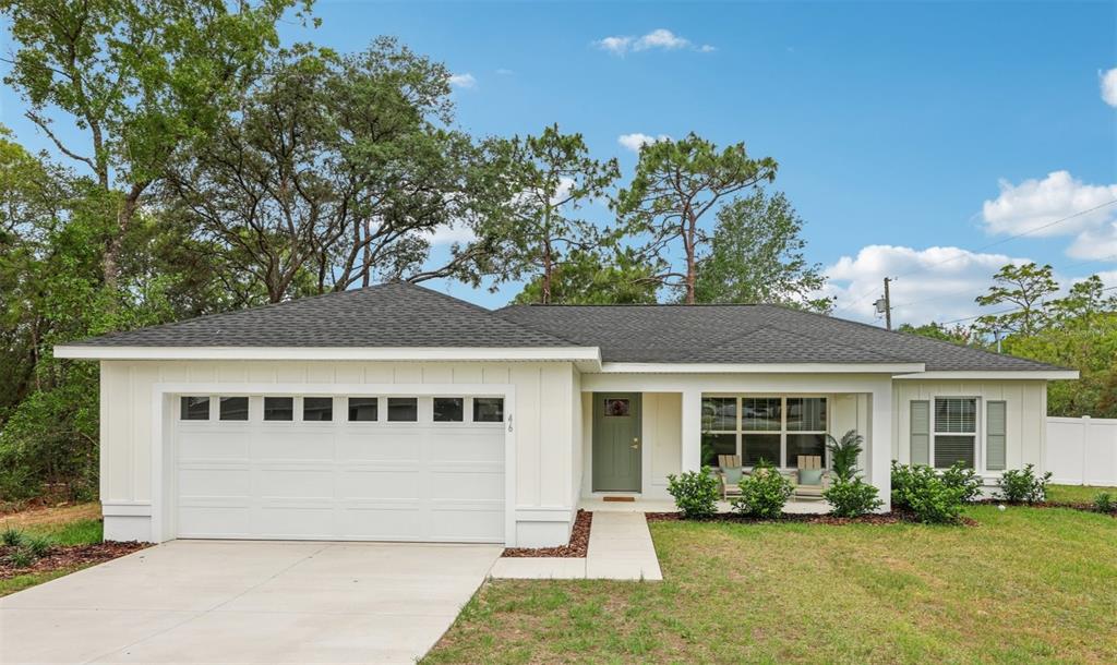 front view of a house with a yard