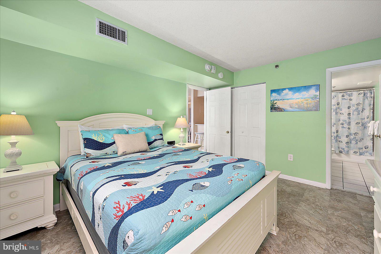 502 Island House Road Bethany Beach, DE 19930 - Photo 24 of 56 a bedroom with a bed and a window