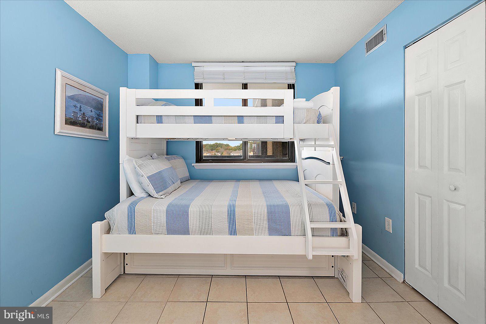 502 Island House Road Bethany Beach, DE 19930 - Photo 32 of 56 a view of kitchen with furniture and cabinets