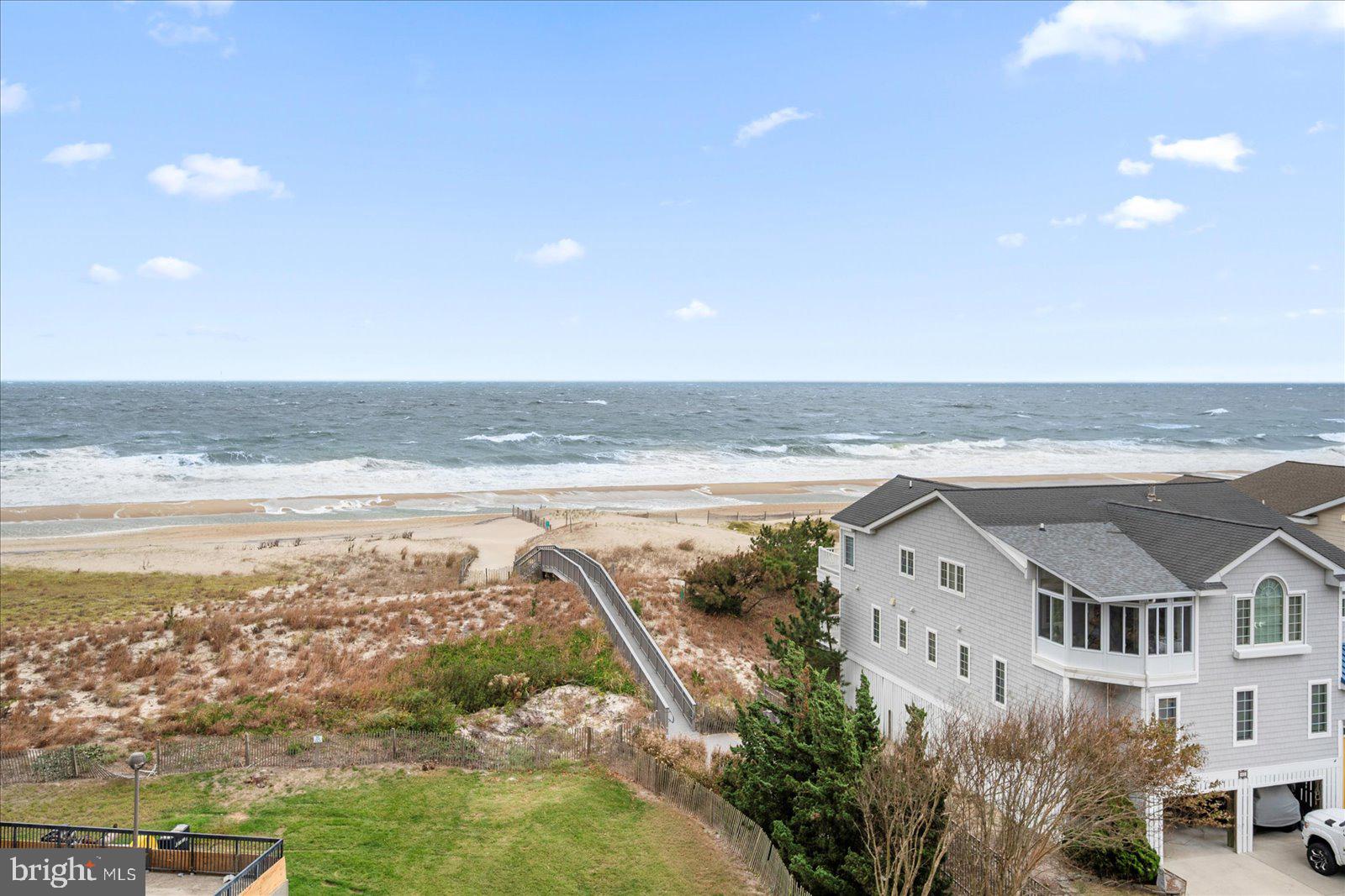 502 Island House Road Bethany Beach, DE 19930 - Photo 41 of 56 a view of an ocean and beach