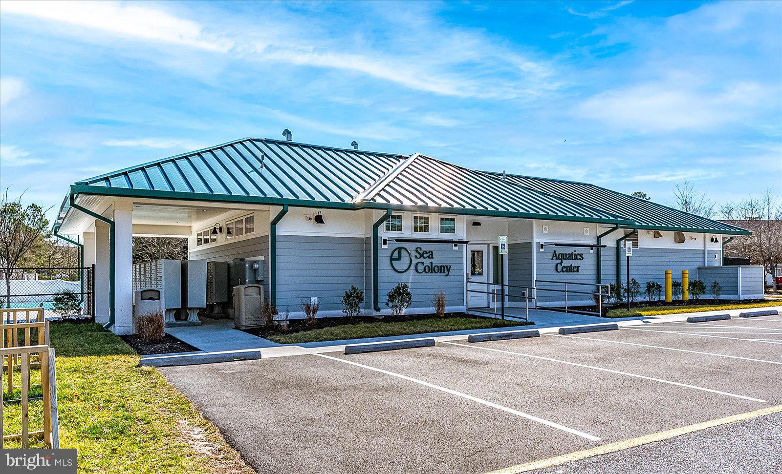 502 Island House Road Bethany Beach, DE 19930 - Photo 49 of 56 front view of a house with a barbeque