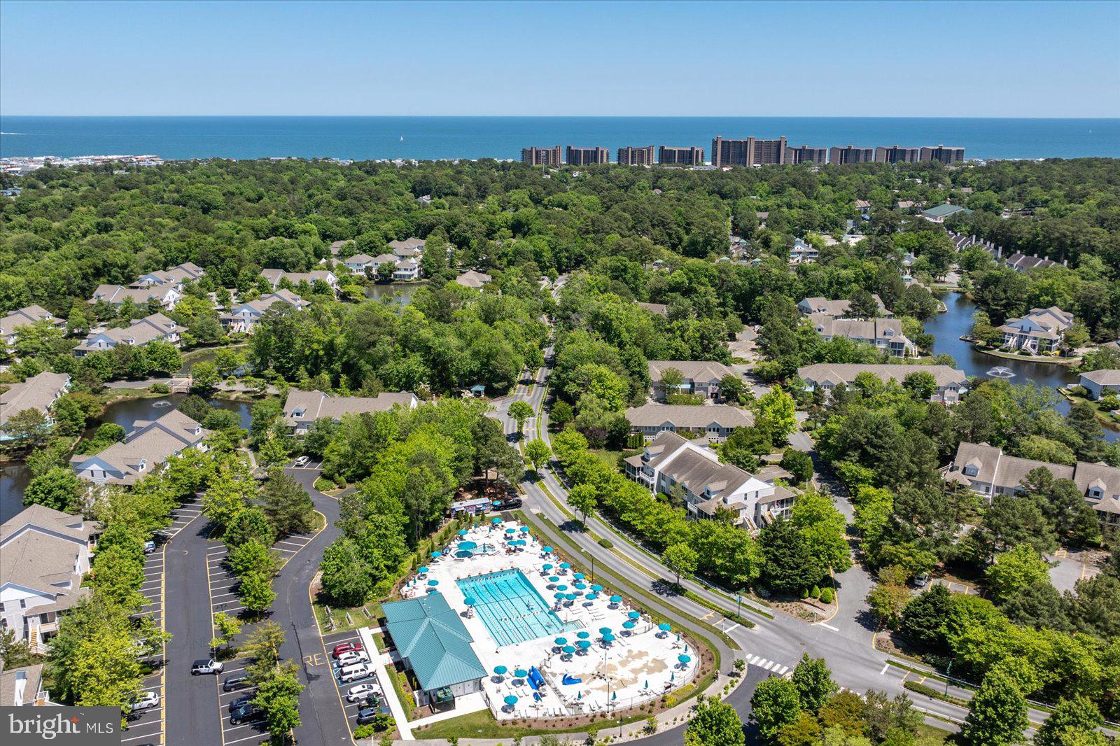 502 Island House Road Bethany Beach, DE 19930 - Photo 51 of 56 an aerial view of residential houses with outdoor space and trees
