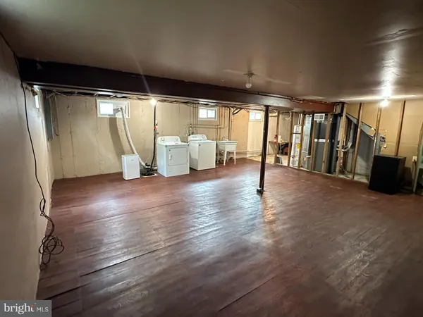 a view of an empty room with glass door