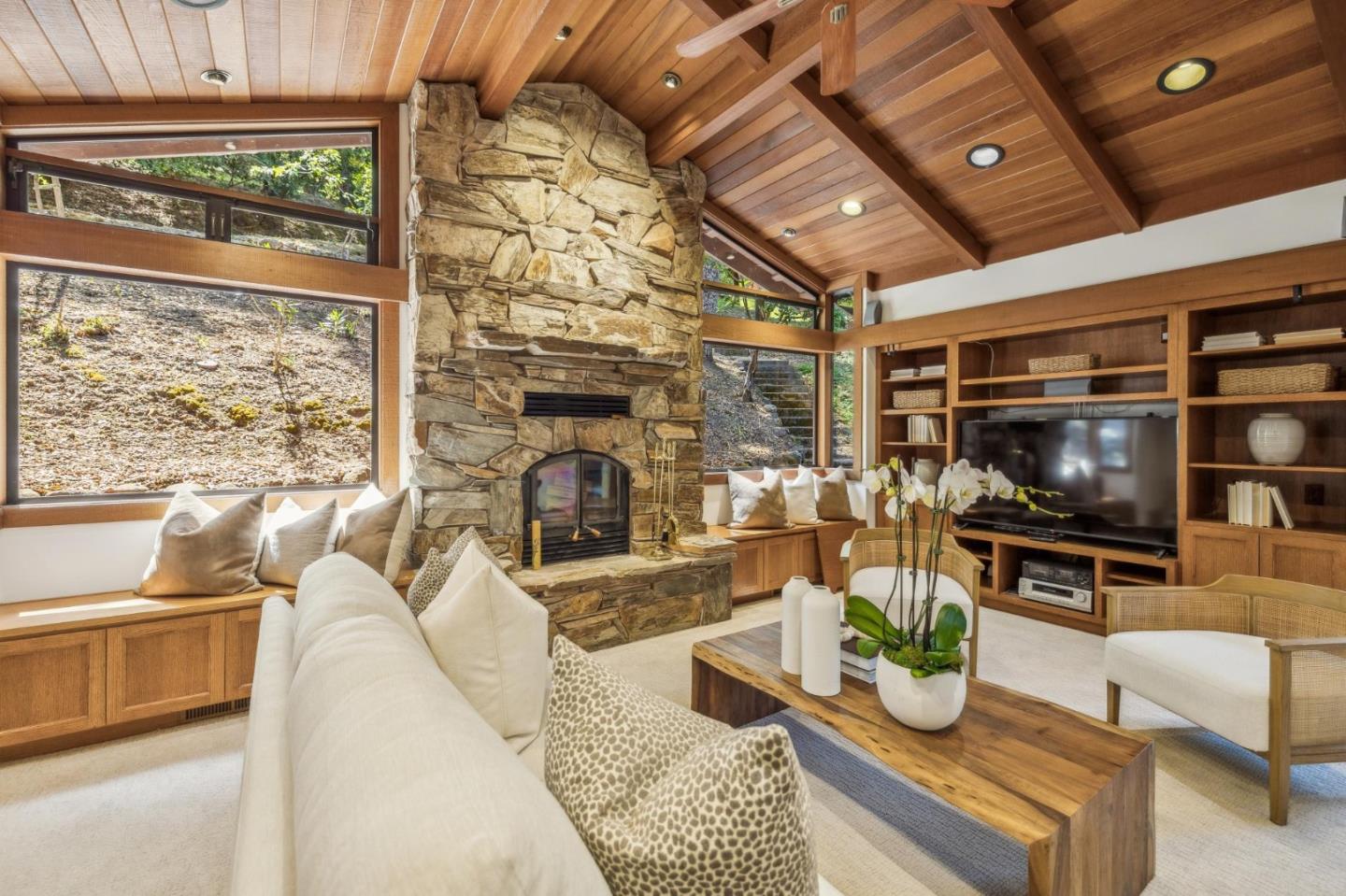 19 Preston Road Woodside, CA 94062 - Photo 7 of 30 a living room with fireplace furniture and a flat screen tv