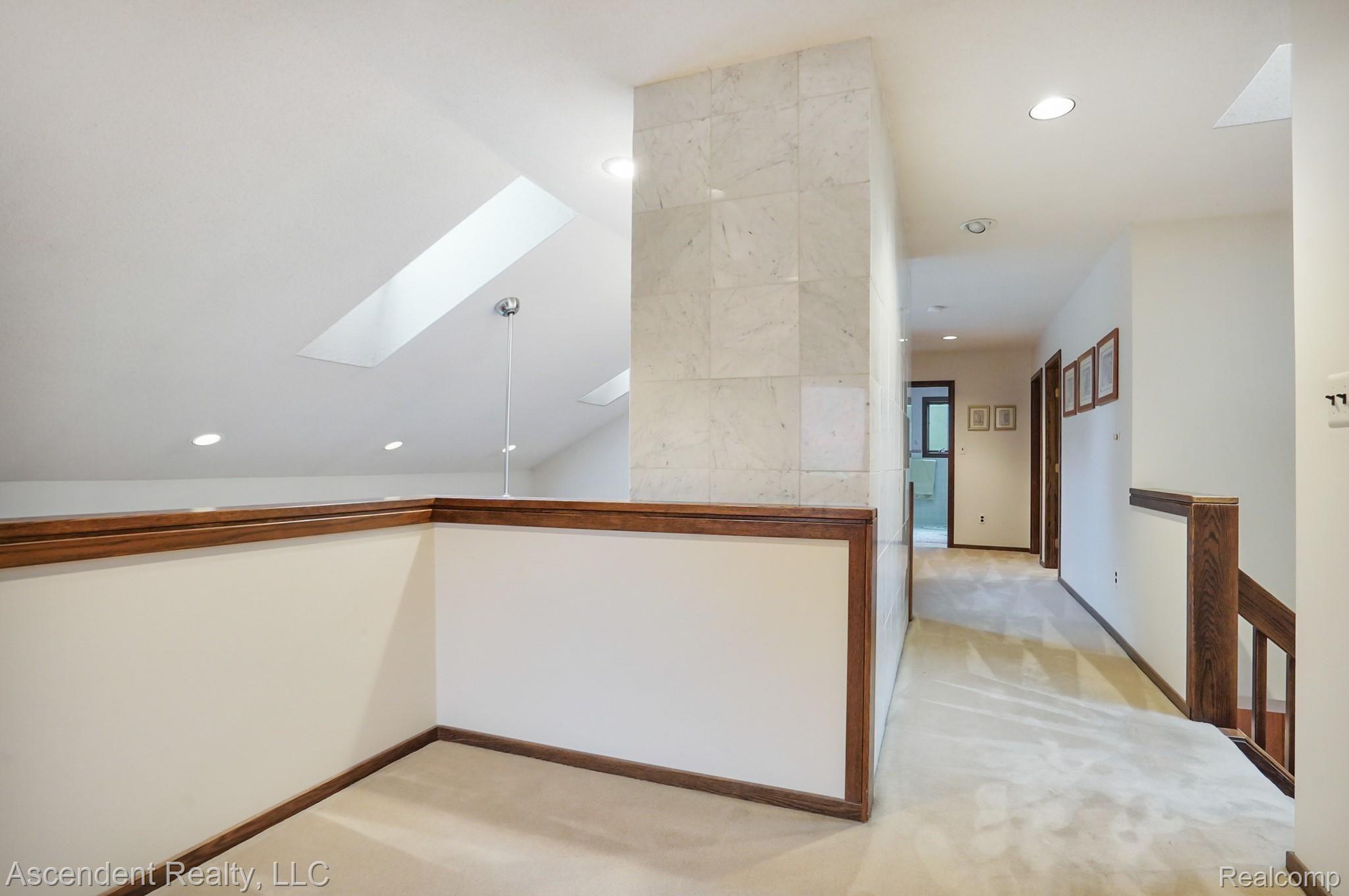3075 Walnut Lake Road West Bloomfield, MI 48322 - Photo 27 of 39 Loft view of bridge to bedrooms