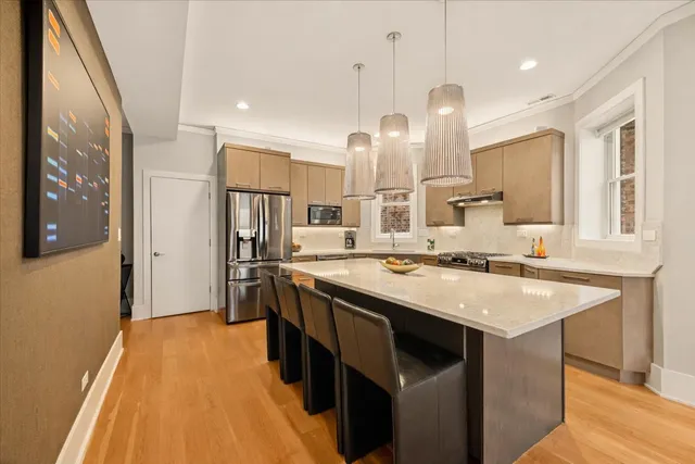 a view of a balcony with outdoor seating