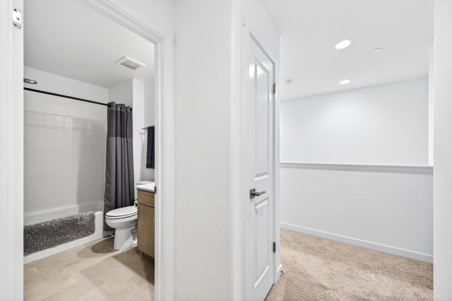 317 Talus Way South Madera, CA 93636 - Photo 37 of 61 a bathroom with a shower and a toilet