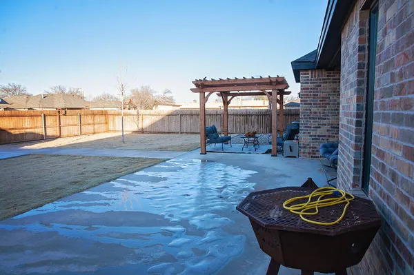 a balcony with table and chairs