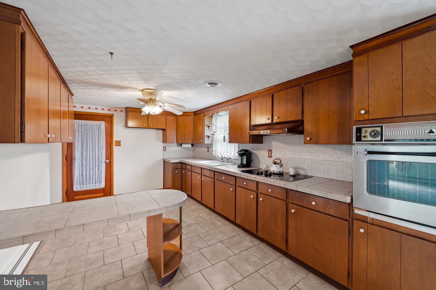 2100 Peterman Road Freeland, MD 21053 - Photo 10 of 25 Warm wood tones in a spacious kitchen.