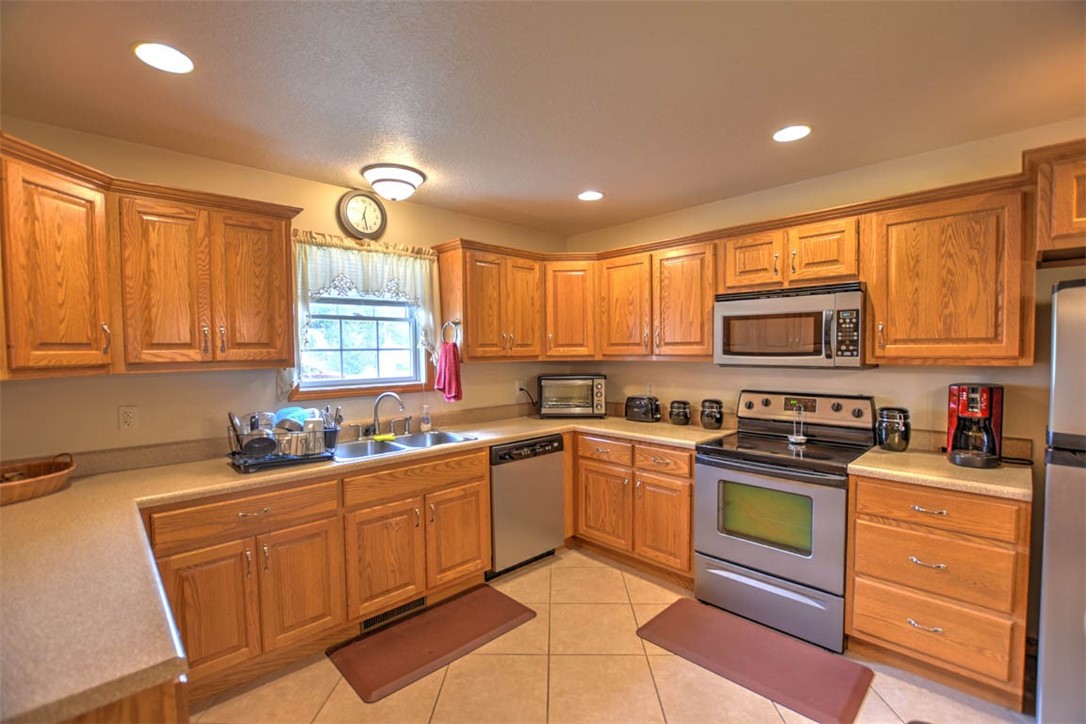 2008 St Louis Bridge Road Decatur, IL 62521 - Photo 16 of 36 a kitchen with sink a window and appliances
