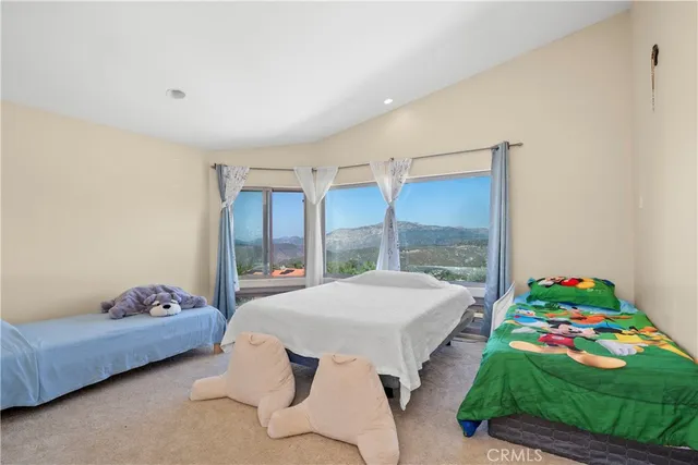 a bathroom with sink a mirror a bathtub and shower