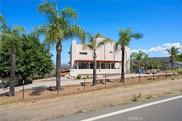 a house view with a outdoor space