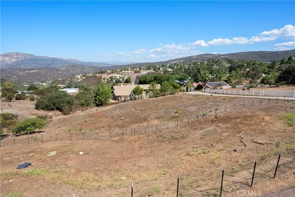 a view of a city with mountain