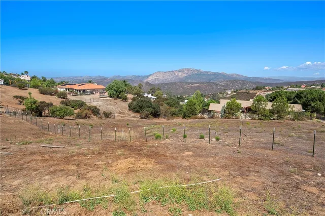 a view of a swimming pool with a lounge chair