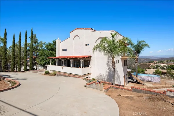 a car parked in front of a house