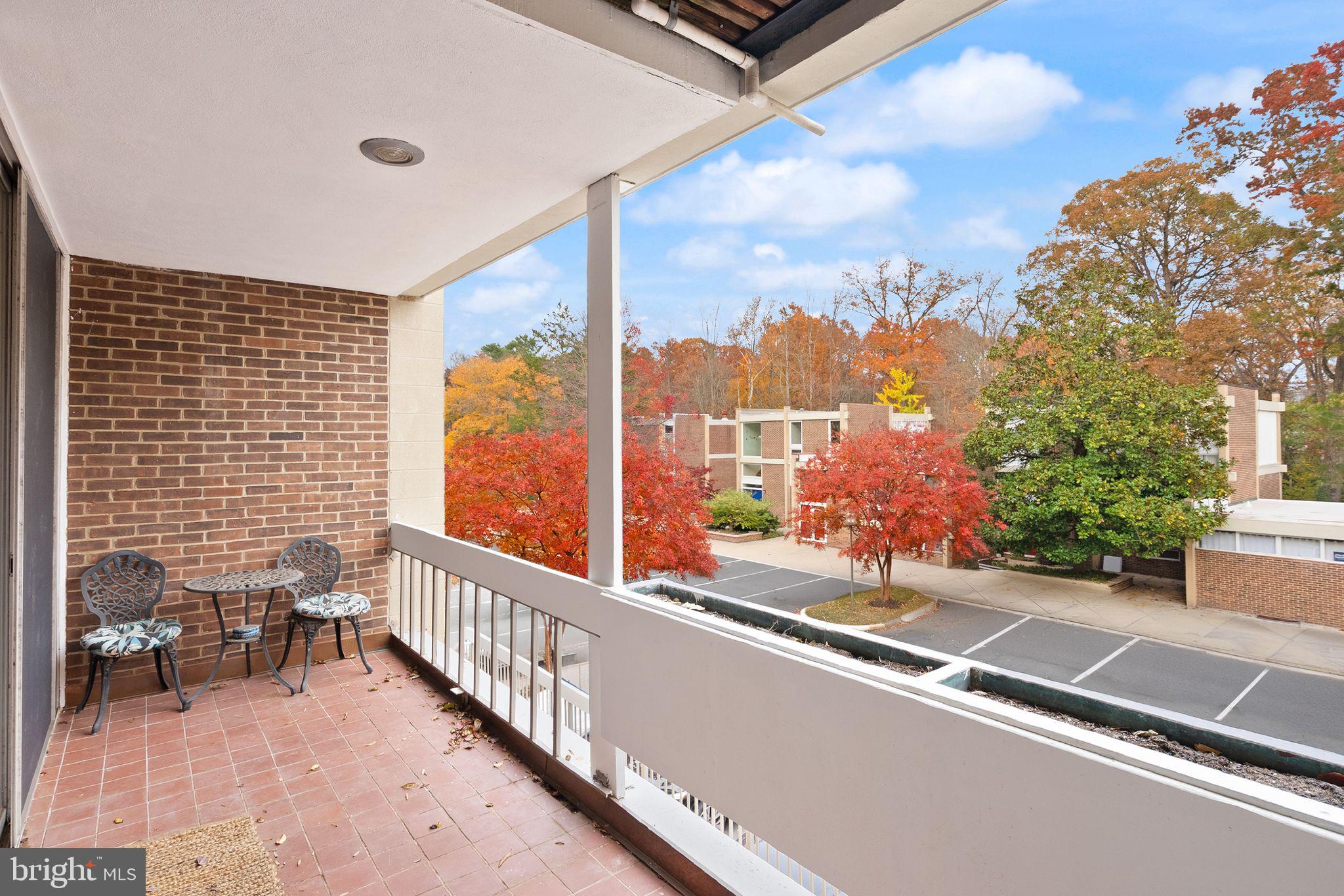 11577 Maple Ridge Road Reston, VA 20190 - Photo 21 of 48 a view of a balcony with chairs