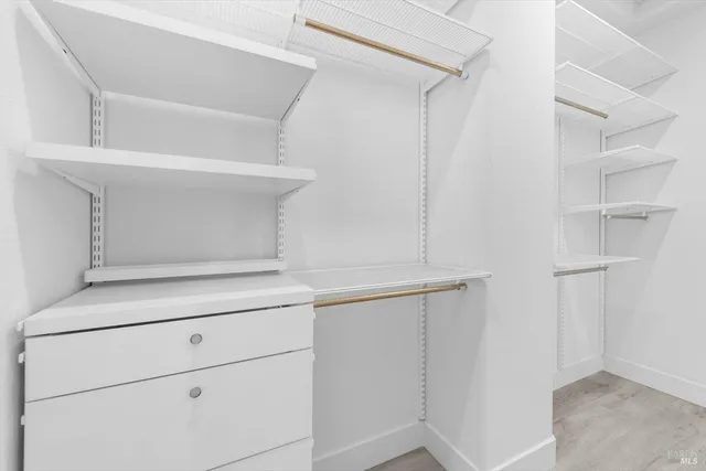 a view of an empty walk in closet
