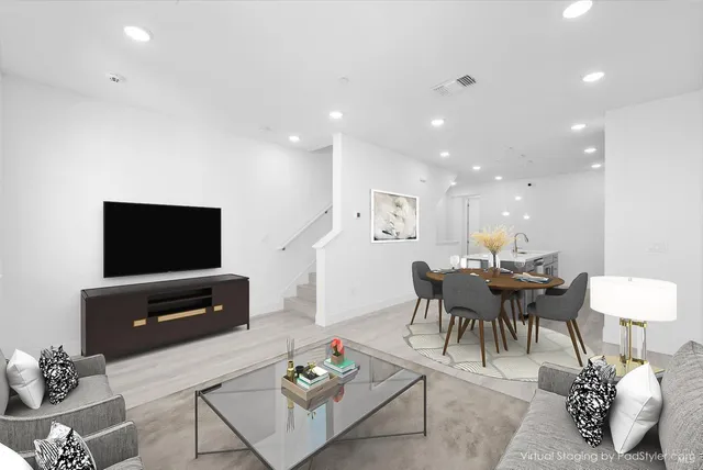 a view of a dining room with furniture