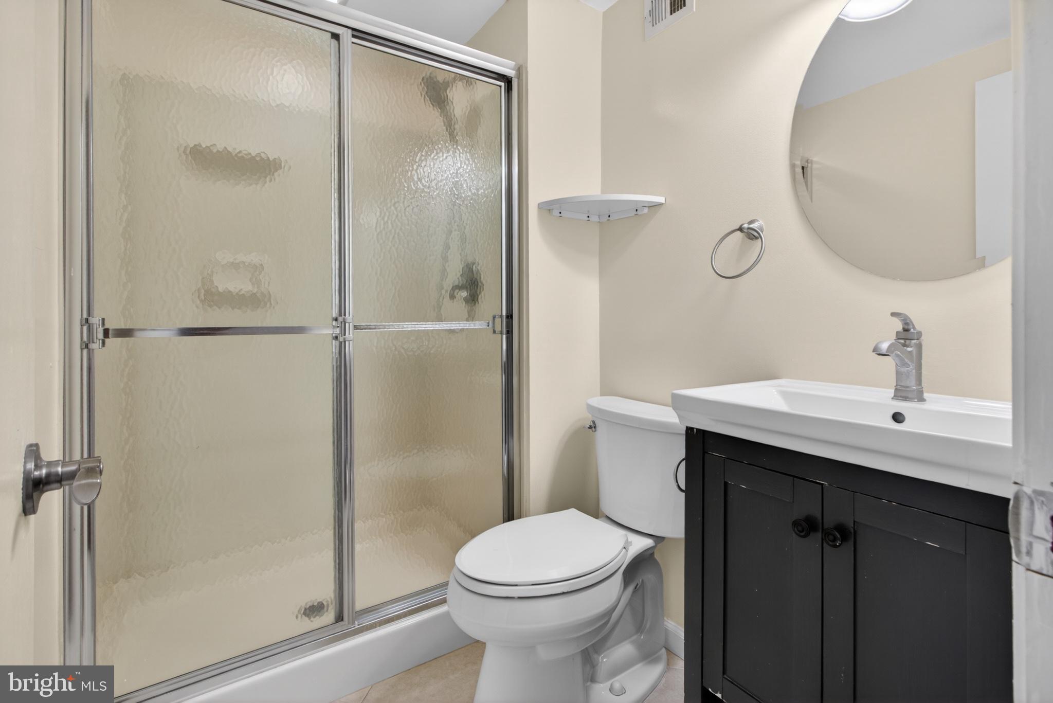 16 Redding Ridge Drive Gaithersburg, MD 20878 - Photo 19 of 53 Modern bathroom with sleek finishes.