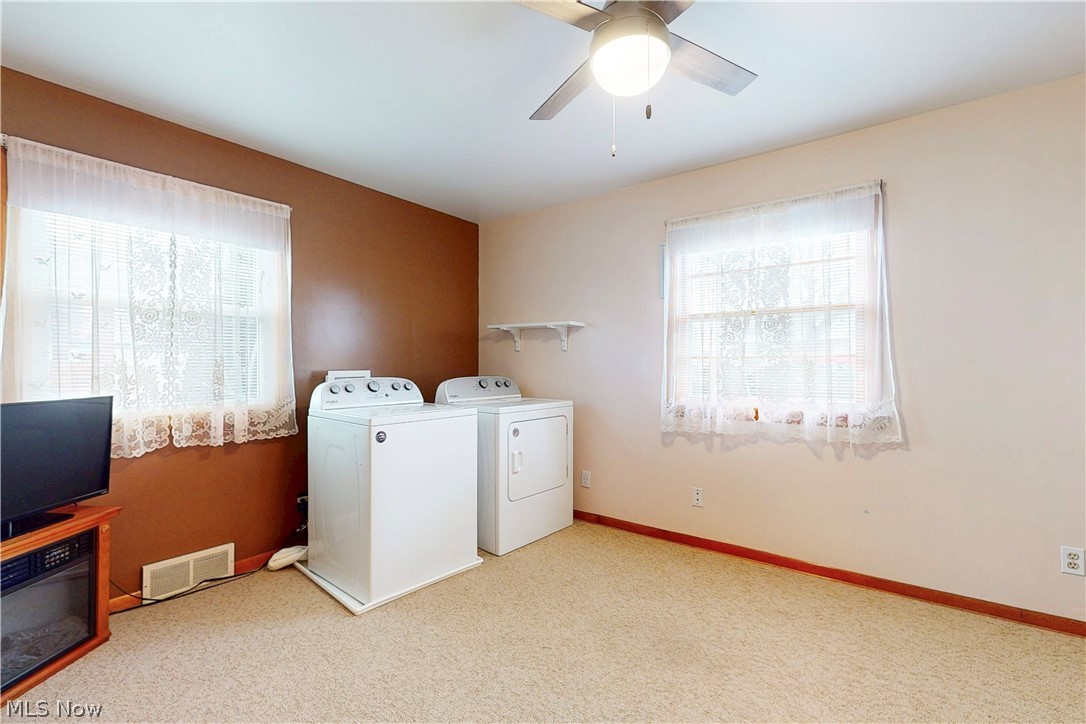 391 Canton Road Steubenville, OH 43953 - Photo 31 of 40 Laundry area with washer and dryer, light carpet, and a ceiling fan