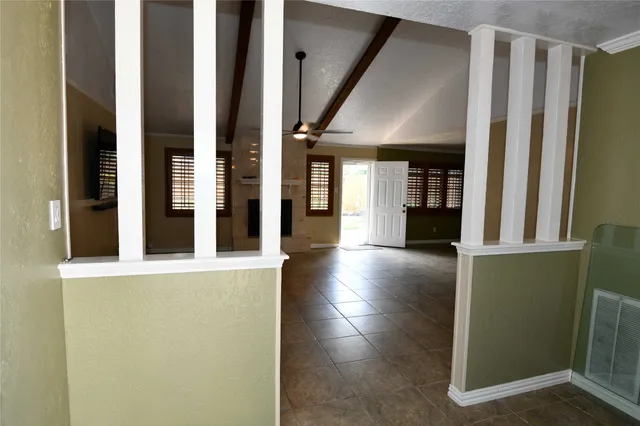 a view of a storage & utility room with a window