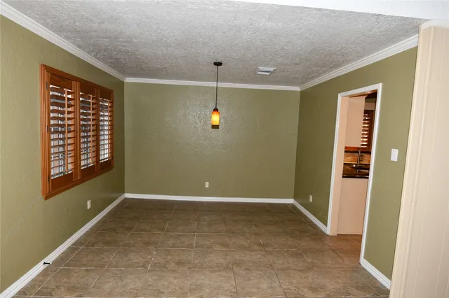 a view of bathroom with a sink and a mirror