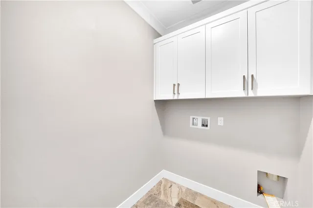 a view of building with wooden floor and potted plant