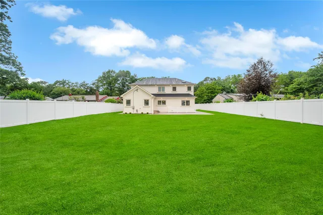 a view of a backyard with green space