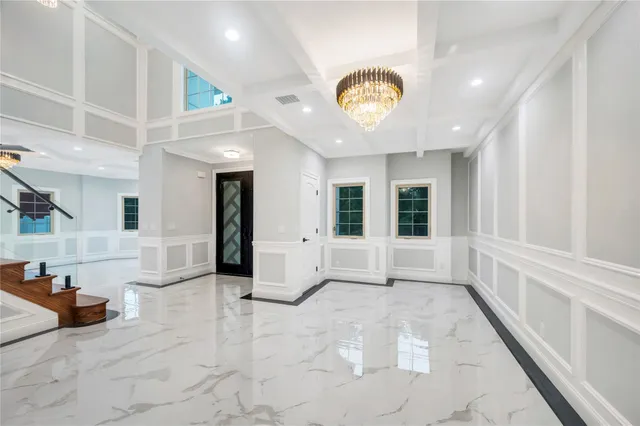 a view of a large room with windows