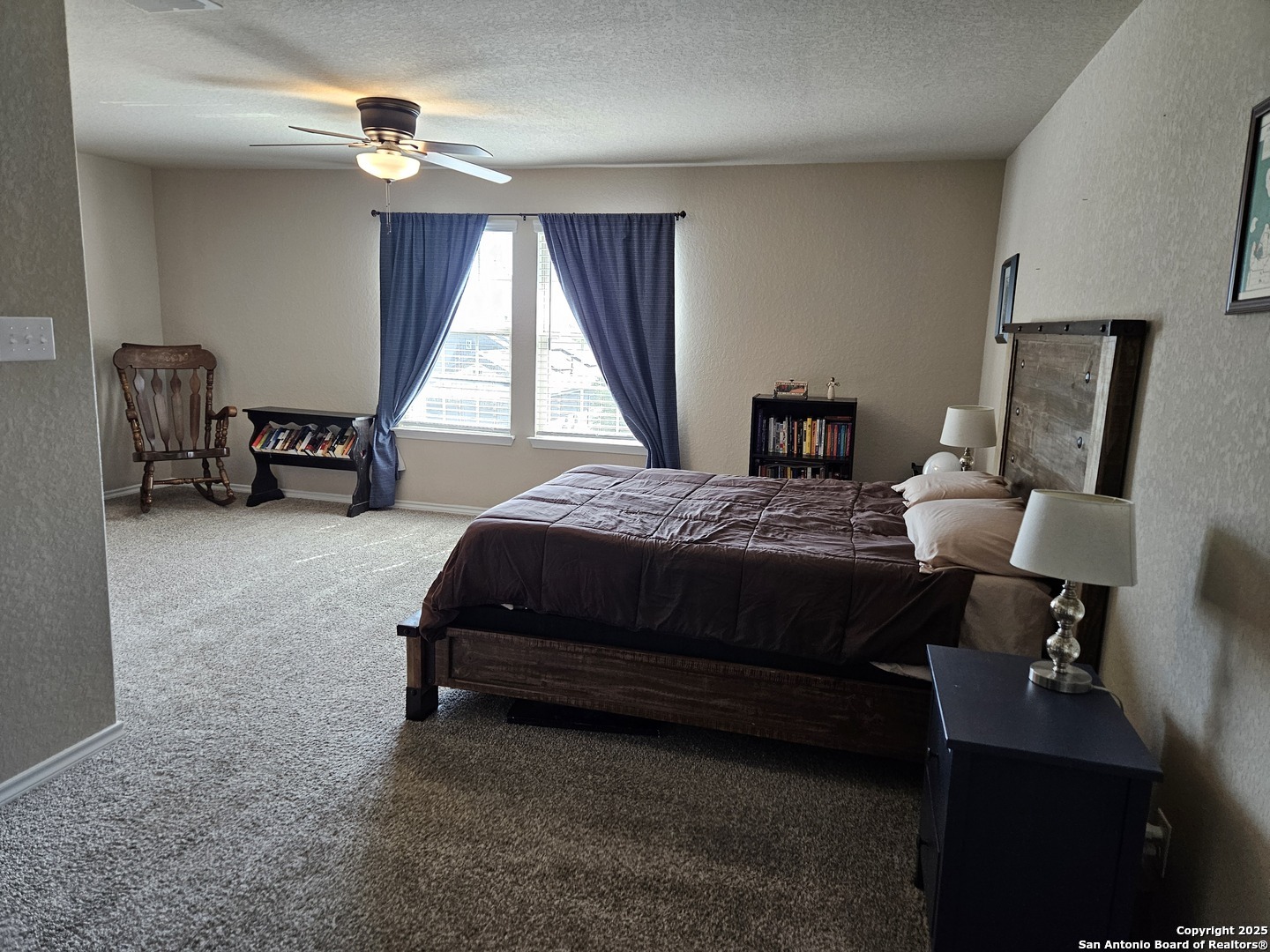 148 Hunters Spring San Antonio, TX 78253 - Photo 11 of 16 a bedroom with bed and a window