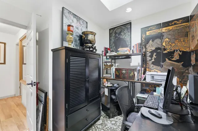a room with furniture and flat screen tv