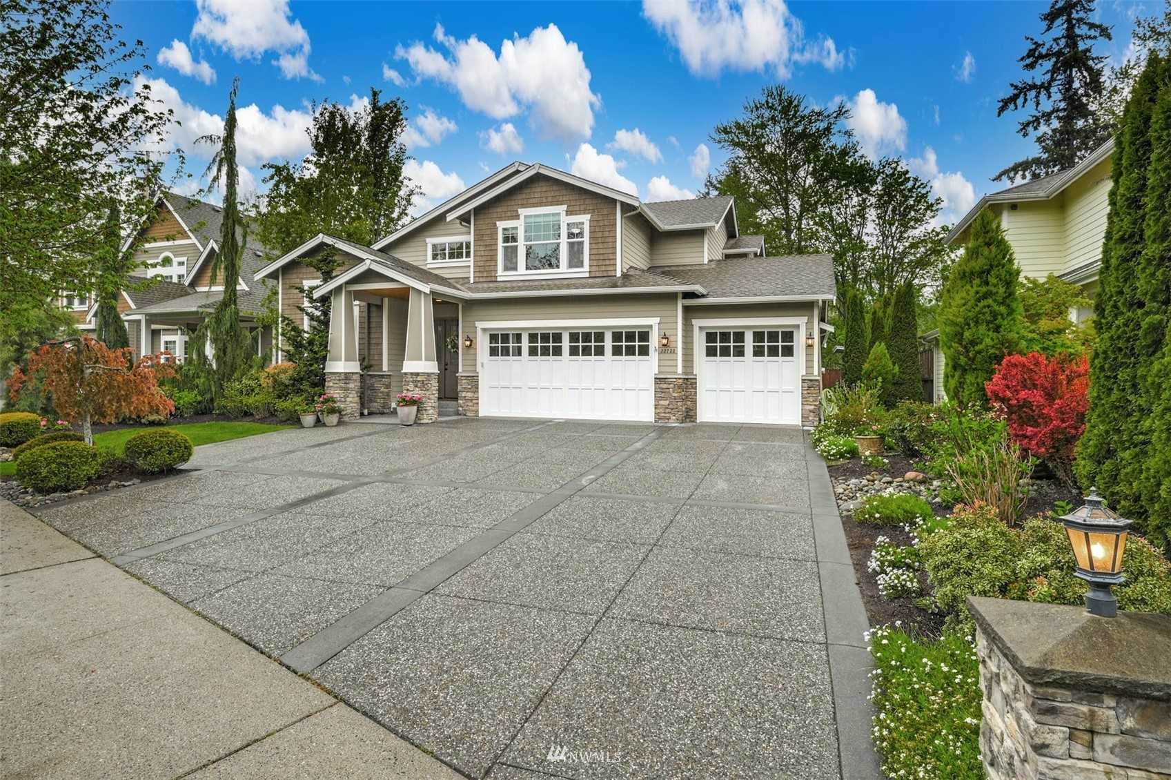 a front view of a house with yard