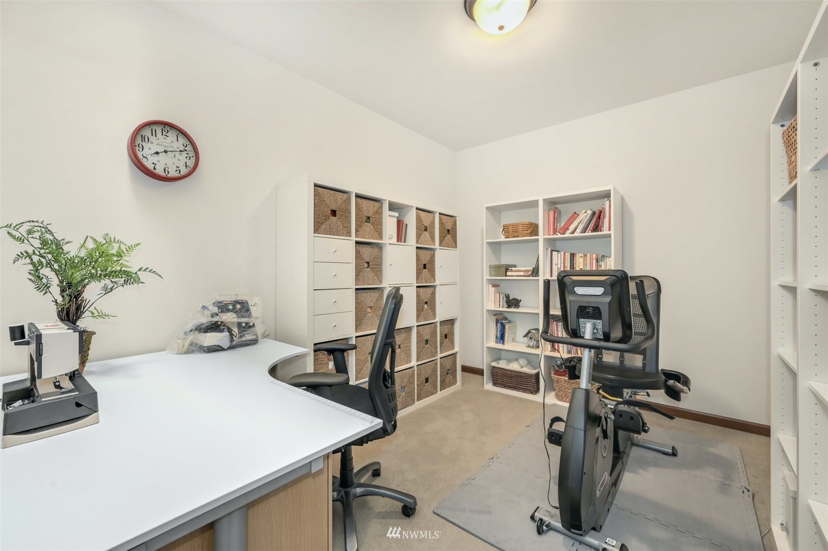 22722 16th Avenue West Bothell, WA 98021 - Photo 20 of 39 a view of a workspace with furniture and a window