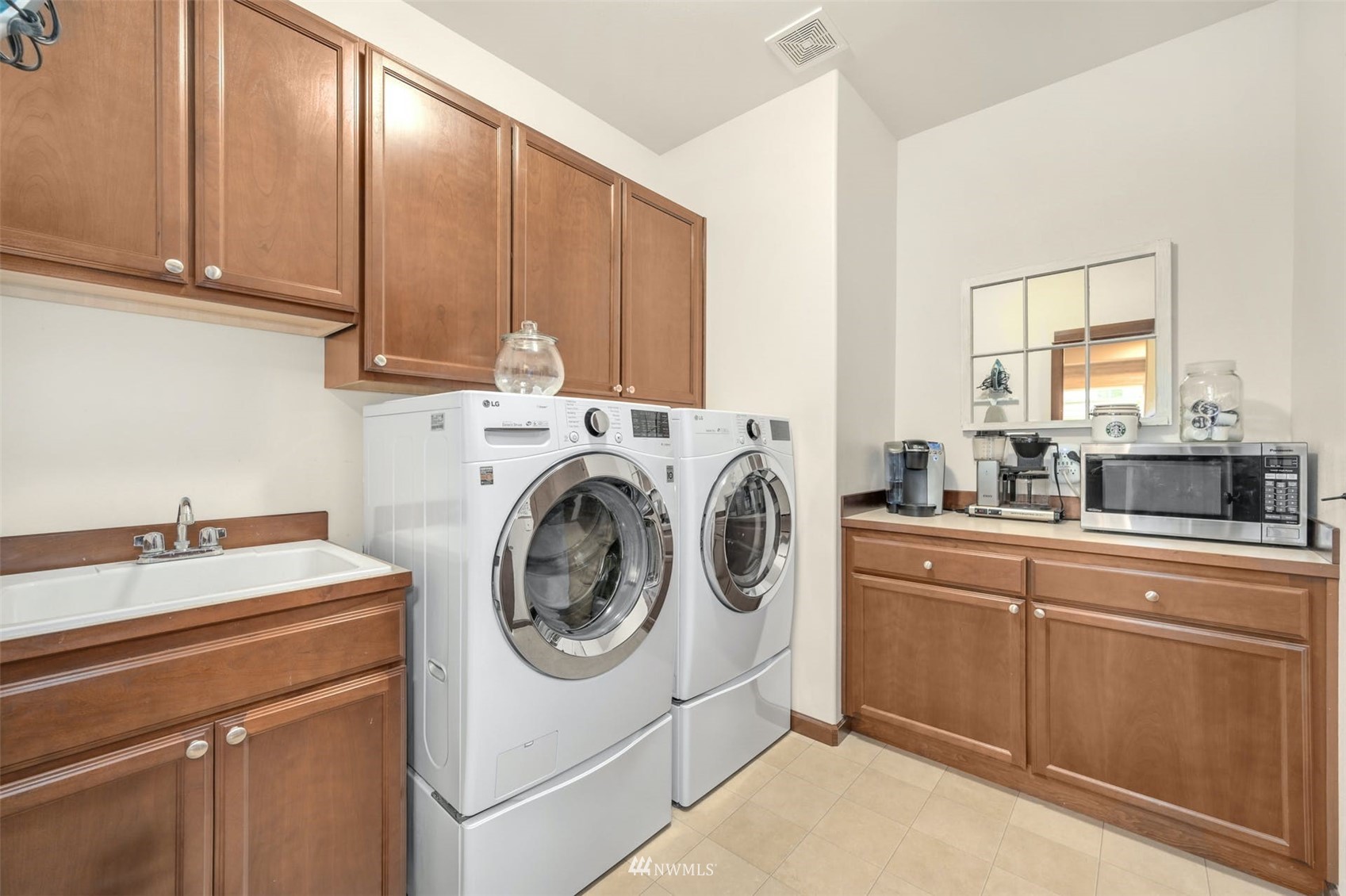 22722 16th Avenue West Bothell, WA 98021 - Photo 22 of 39 a utility room with sink dryer and washer