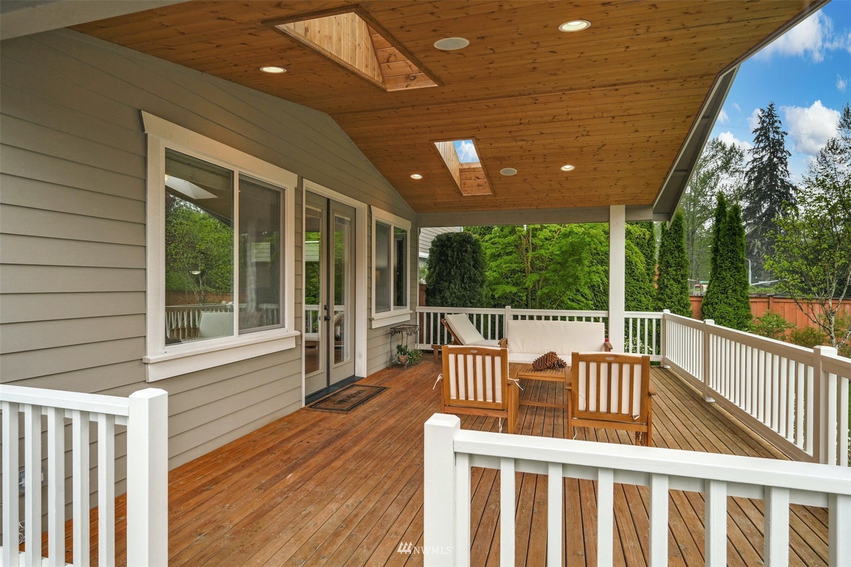 22722 16th Avenue West Bothell, WA 98021 - Photo 32 of 39 a view of a chair and table in the balcony