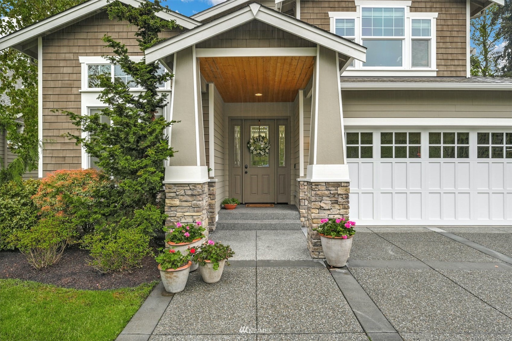 22722 16th Avenue West Bothell, WA 98021 - Photo 4 of 39 a front view of a house with outdoor seating