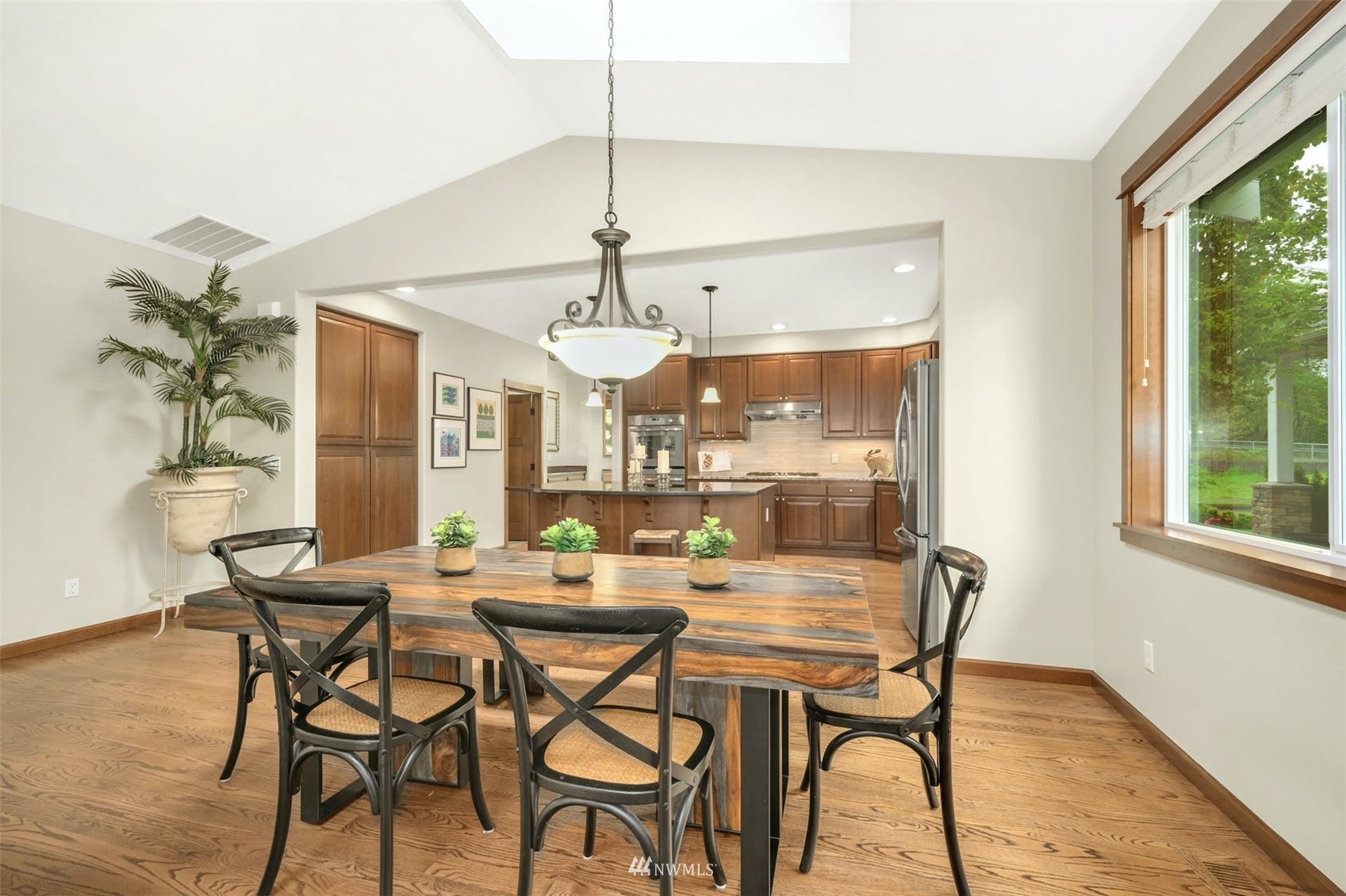 22722 16th Avenue West Bothell, WA 98021 - Photo 9 of 39 a view of a dining room with furniture window and outside view