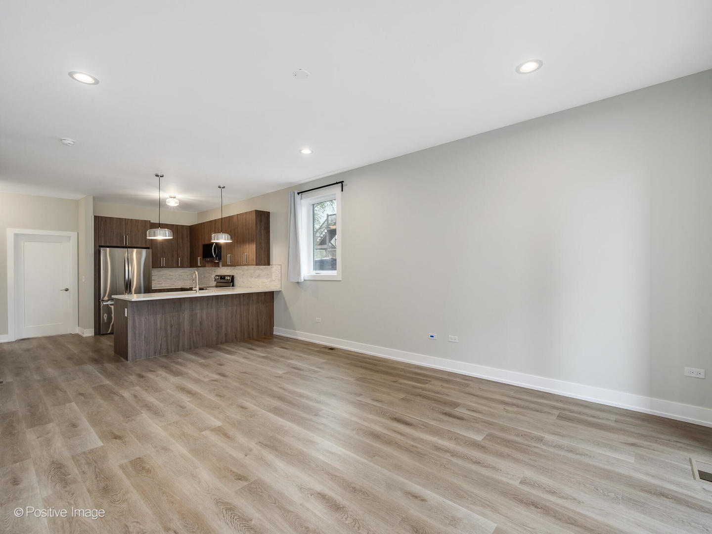 3956 South Indiana Avenue, Unit 1F Chicago, IL 60653 - Photo 6 of 12 a view of kitchen and kitchen with microwave